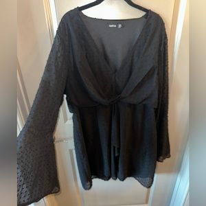 Long sleeve black dress with a dot texture